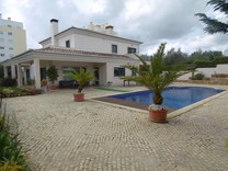 Солидная вилла рядом с центром Портимао